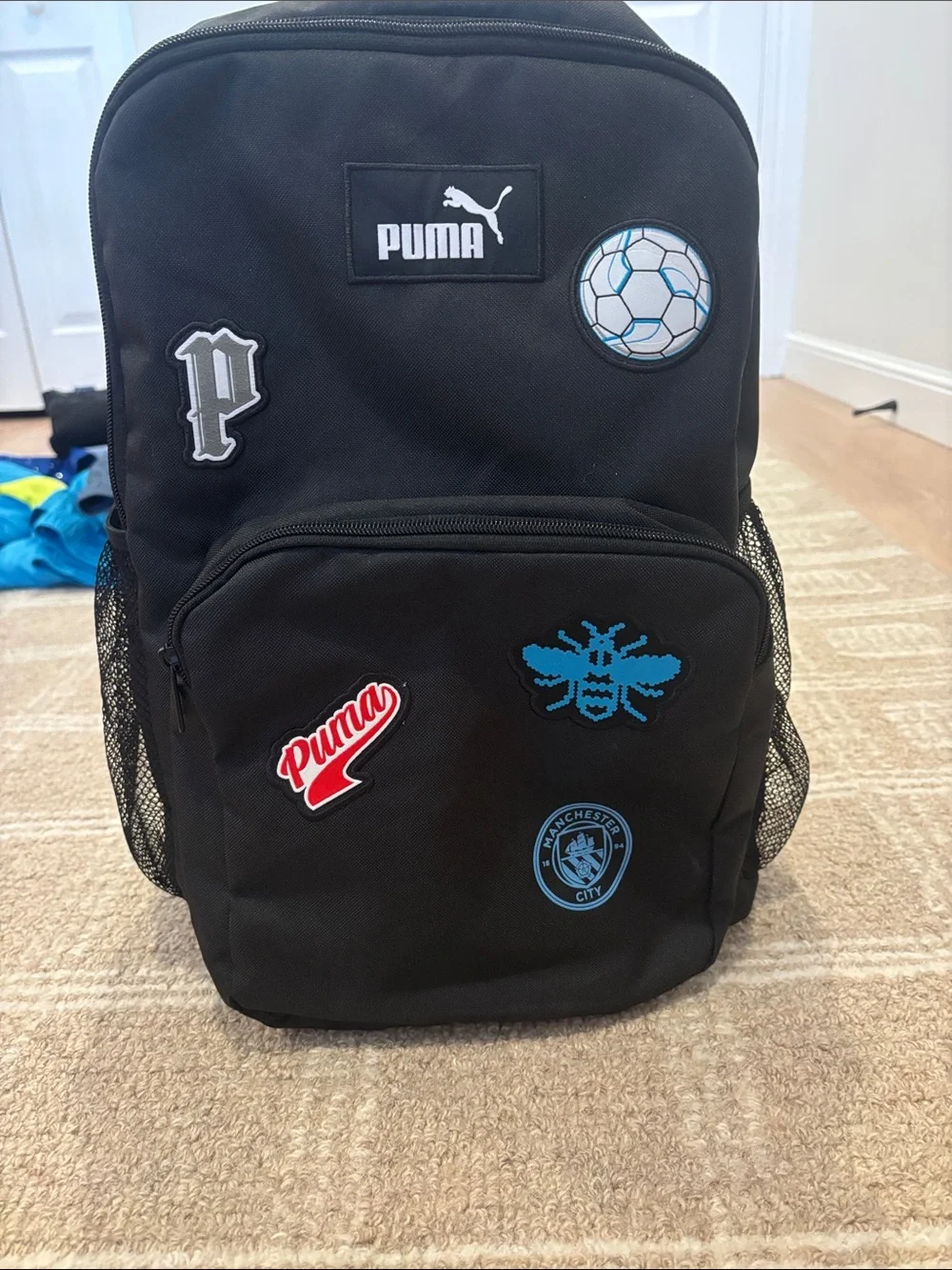 Puma Black Backpack with Blue and White Patch Details (unisex)